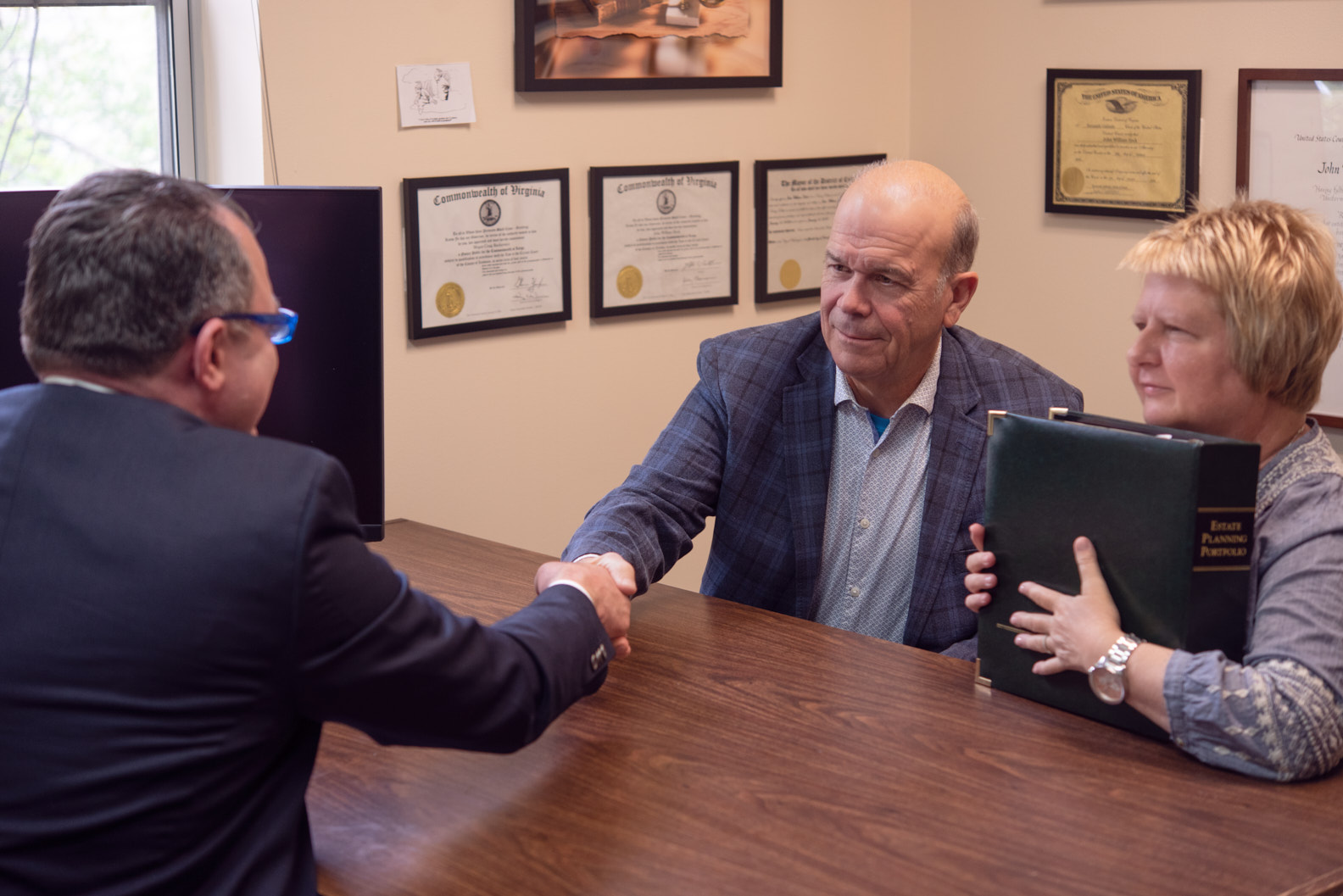 A client meeting with John at the firm.